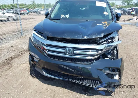2018 Honda Pilot Touring z USA, uszkodzony, nr VIN 5FNYF6H9XJB060555